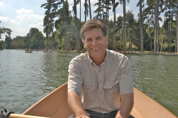 Robert rows the boat; Vicky navigates.